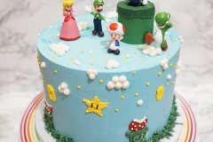 Mario Party: Chocolate Cake with Strawberry Swiss Meringue Buttercream and Fresh Strawberry Pieces