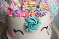 Unicorn - Chocolate Cake with Passion fruit Curd Filling and Vanilla Swiss Meringue Buttercream.