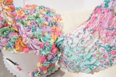 Unicorn - Chocolate Cake with Passion fruit Curd Filling and Vanilla Swiss Meringue Buttercream.