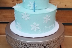 Vanilla Cake with Vanilla Swiss Meringue Buttercream. Adorned with edible Snowflake paper wafers