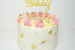 Funfetti Cake with Pineapple Swiss Meringue Buttercream. With a surprise money box in the center.