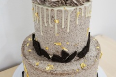 Chocolate Cake filled with Oreo Swiss Meringue Buttercream + crushed Oreo. Covered with Oreo Swiss Meringue Buttercream