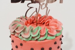Watermelon Cake with Chocolate Chips, filled with Watermelon Swiss Meringue Buttercream. Decorated to look like a watermelon!