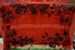 Watermelon Cake with Chocolate Chips, filled with Watermelon Swiss Meringue Buttercream. Decorated to look like a watermelon!