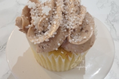 Vanilla Cupcake filled with Creme Patisserie. Topped with Chocolate Swiss Meringue Buttercream